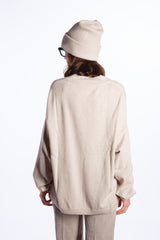 NORA | SCOLLO V OVER