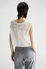 White embroidered sleeveless blouse